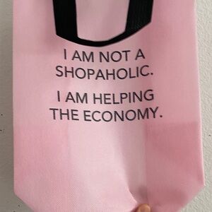 Pink Tote Bag with Black Text "I Am Not A Shopaholic"